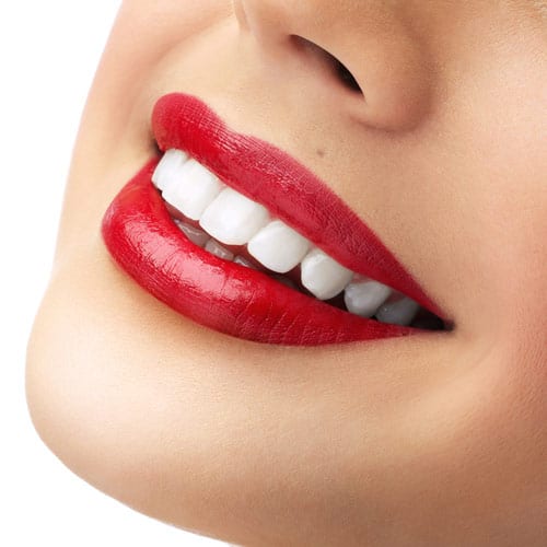 up-close smiling lady with lipstick after cosmetic work